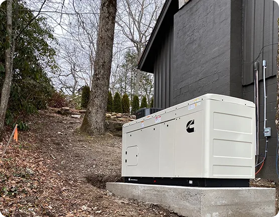 Whole-house standby generator installed beside home
